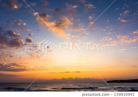 epic sky view at the black sea during sunrise. atmospheric background for travel wallpaper. cloudy sky above the water. clouds over horizon. nature landscape of bulgaria sea bay in summer 139910991