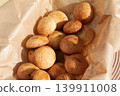 Golden Brown Homemade Cookies on Parchment Paper 139911008