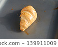 croissant on a Baking Sheet 139911009