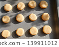 Unbaked Cookie Dough Balls on Baking Sheet 139911012