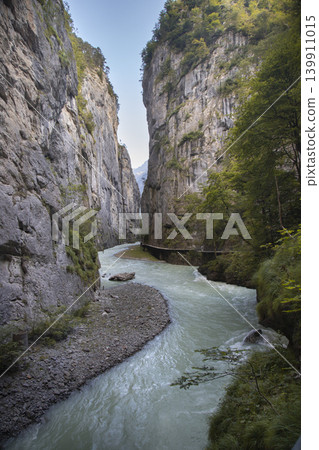 Aare gorge river flowing through narrow canyon 139911015