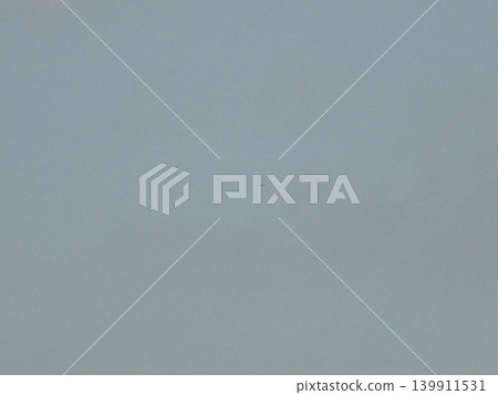 Early Evening view on sky with a bird silhouette in very large distance. 139911531
