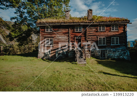 Old wooden house with a roof covered with grass, Norway Old wooden house with a roof covered with grass, Norway 139913220