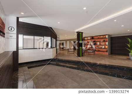 Modern Reception Lobby Interior with Elegant Lighting and Contemporary Design Modern Reception Lobby Interior with Elegant Lighting and Contemporary Design 139913274