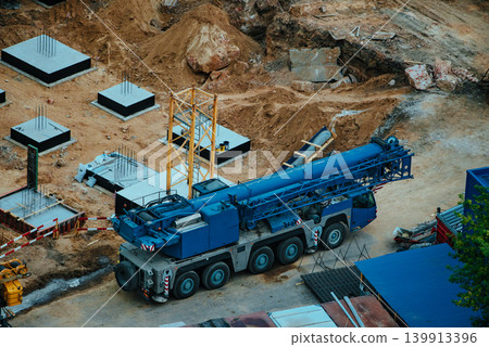 A large crane at a construction site A large crane at a construction site 139913396