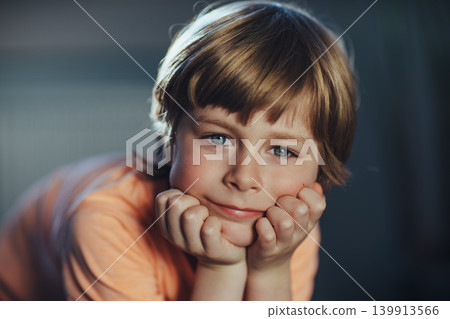 Portrait of cute thoughtful boy 139913566