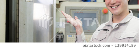 A young engineer in a trustworthy and reliable pose, performing quality control and equipment inspections. Stay safe today! (Faceless banner) A young engineer in a trustworthy and reliable pose, performing quality control and equipment inspections. Stay safe today! (Faceless banner) 139914189