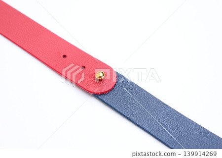dark blue and red leather strap isolated on white background dark blue and red leather strap isolated on white background 139914269