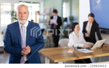 Elderly man got a job for half a day to work in a successful company 139914413