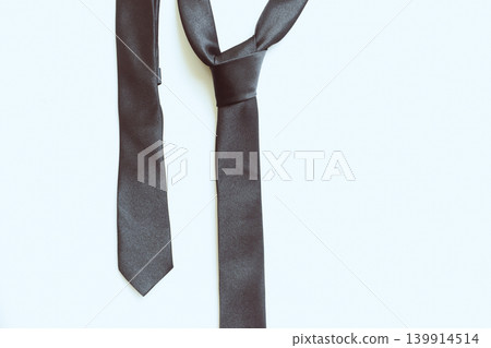 black necktie isolated on white background, father day concept and business style black necktie isolated on white background, father day concept and business style 139914514