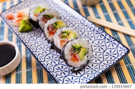 Japanese roll futomaki with soy sauces Japanese roll futomaki with soy sauces 139914667
