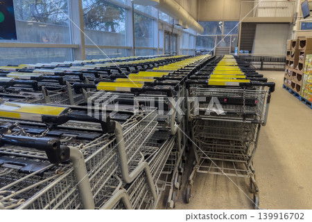 Rows of Shopping Carts Indoors Rows of Shopping Carts Indoors 139916702