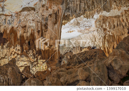 Cave interior featuring stalactites and stalagmites in Mallorca, Spain, travel destination Cave interior featuring stalactites and stalagmites in Mallorca, Spain, travel destination 139917010