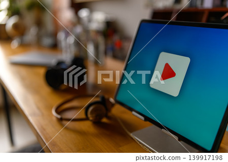 Laptop and play button 139917198