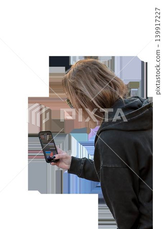 Woman takes a photo on a mobile phone against a transparent background. High quality photo Woman takes a photo on a mobile phone against a transparent background. High quality photo 139917227
