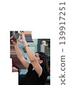 Woman takes a photo on a mobile phone against a transparent background. High quality photo 139917251