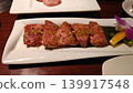 Beautifully marbled, high-grade Wagyu beef short ribs served at a yakiniku restaurant. 139917548
