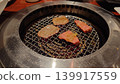 Delicious-looking Wagyu beef and beef tongue grilled to perfection on a grill. 139917559