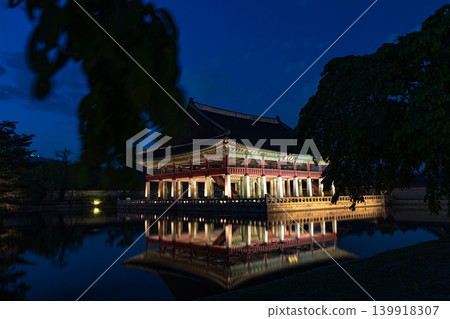 Seoul, South Korea - May. 14, 2026 : Magnificent night view of Gyeonghoeru Pavilion reflected in the pond during the spring night opening at Gyeongbokgung Palace, Seoul 139918307