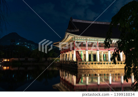 Seoul, South Korea - May. 14, 2026 : Magnificent night view of Gyeonghoeru Pavilion reflected in the pond during the spring night opening at Gyeongbokgung Palace, Seoul 139918834