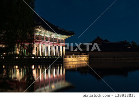Seoul, South Korea - May. 14, 2026 : Magnificent night view of Gyeonghoeru Pavilion reflected in the pond during the spring night opening at Gyeongbokgung Palace, Seoul 139918835