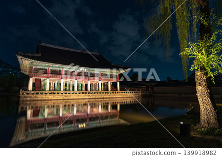 Seoul, South Korea - May. 14, 2026 : Magnificent night view of Gyeonghoeru Pavilion reflected in the pond during the spring night opening at Gyeongbokgung Palace, Seoul 139918982