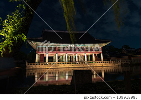 Seoul, South Korea - May. 14, 2026 : Magnificent night view of Gyeonghoeru Pavilion reflected in the pond during the spring night opening at Gyeongbokgung Palace, Seoul 139918983