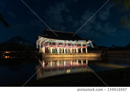 Seoul, South Korea - May. 14, 2026 : Magnificent night view of Gyeonghoeru Pavilion reflected in the pond during the spring night opening at Gyeongbokgung Palace, Seoul Seoul, South Korea - May. 14, 2026 : Magnificent night view of Gyeonghoeru Pavilion reflected in the pond during the spring night opening at Gyeongbokgung Palace, Seoul 139918987
