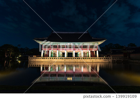Seoul, South Korea - May. 14, 2026 : Magnificent night view of Gyeonghoeru Pavilion reflected in the pond during the spring night opening at Gyeongbokgung Palace, Seoul Seoul, South Korea - May. 14, 2026 : Magnificent night view of Gyeonghoeru Pavilion reflected in the pond during the spring night opening at Gyeongbokgung Palace, Seoul 139919109