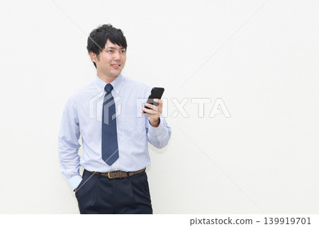Businessmen with smartphones Businessmen with smartphones 139919701