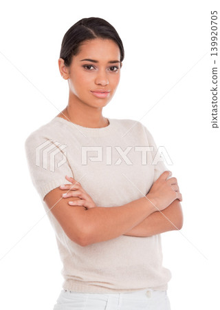 Fashion, portrait and woman with arms crossed in studio with confidence, attitude and style on white background. Clothes, pride and female model posing with trendy, cool or neutral outfit choice 139920705