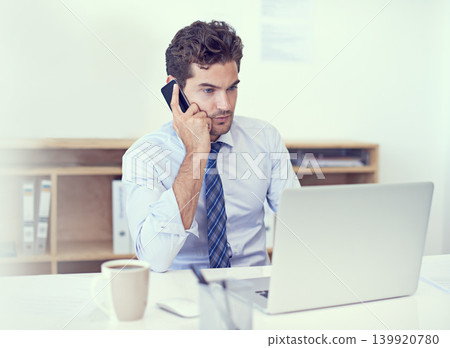 Man, phone call and laptop in office for conversation with internet search for client loan, discussion or deal. Male person, cellphone and talking in New York for planning, investment or connection Man, phone call and laptop in office for conversation with internet search for client loan, discussion or deal. Male person, cellphone and talking in New York for planning, investment or connection 139920780