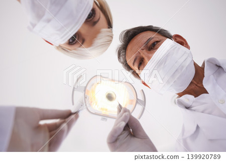 Dentist, team and portrait of people with light for consulting, teeth whitening and wellness. Healthcare, dentistry and man and woman with tools for dental hygiene, oral care and medical services Dentist, team and portrait of people with light for consulting, teeth whitening and wellness. Healthcare, dentistry and man and woman with tools for dental hygiene, oral care and medical services 139920789