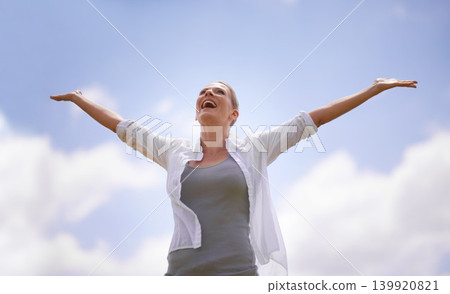 Happy woman, freedom and joy with open arms for success, health and wellness with blue sky background. Female person with smile in relax for achievement, accomplishment or winning on mockup space 139920821