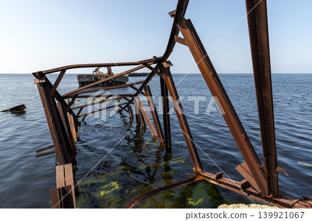 Perspective view of weathered rusted metal structure Perspective view of weathered rusted metal structure 139921067