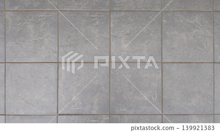 Background texture for the entrance approach and outdoor floor tiles (gray and beige tones) of an apartment building. Background texture for the entrance approach and outdoor floor tiles (gray and beige tones) of an apartment building. 139921383