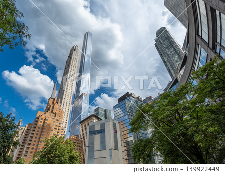 New york, usa august 20,2024. New york city skyscrapers rise above central park's edge under a cloudy sky, highlighting modern skyline, architecture and urban growth New york, usa august 20,2024. New york city skyscrapers rise above central park's edge under a cloudy sky, highlighting modern skyline, architecture and urban growth 139922449