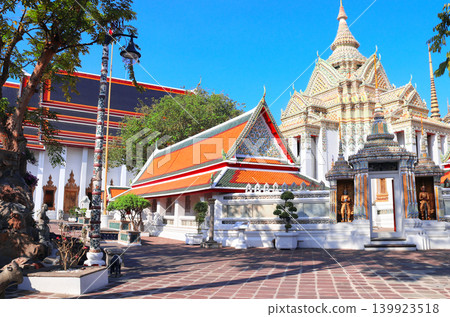 Entrance to Phra Mondop in Wat Pho (Temple of the Reclining Buddha, Wat Phra Chetuphon) complex, sightseeing landmark of Bangkok, Thailand. Topic of vacation, travel, trip, cruises, tour Entrance to Phra Mondop in Wat Pho (Temple of the Reclining Buddha, Wat Phra Chetuphon) complex, sightseeing landmark of Bangkok, Thailand. Topic of vacation, travel, trip, cruises, tour 139923518