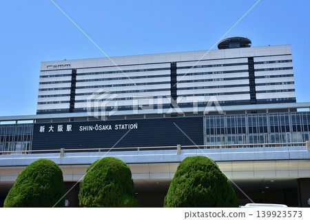 JR Shin-Osaka Station under a blue sky JR Shin-Osaka Station under a blue sky 139923573