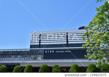 JR Shin-Osaka Station under a blue sky JR Shin-Osaka Station under a blue sky 139923575