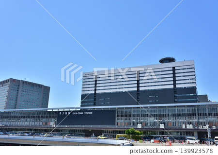 JR Shin-Osaka Station under a blue sky JR Shin-Osaka Station under a blue sky 139923578