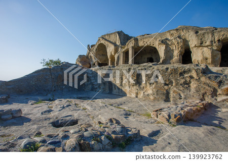 Georgian cave city, Uplistsikhe Cave Town-Fortress. Archaeological site featuring the ruins Georgian cave city, Uplistsikhe Cave Town-Fortress. Archaeological site featuring the ruins 139923762