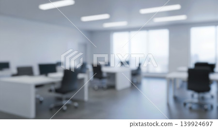 Blurred abstract background showing modern empty white corporate business office interior space featuring multiple work desks, providing clean bright professional working workplace environment 139924697