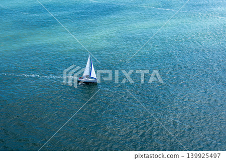 Sailboat gliding through the bay near Golden Gate Bridge, San Francisco Sailboat gliding through the bay near Golden Gate Bridge, San Francisco 139925497