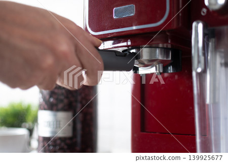 Preparing espresso coffee in a modern kitchen Preparing espresso coffee in a modern kitchen 139925677
