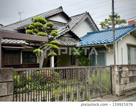 A Showa-era house with blue roof tiles A Showa-era house with blue roof tiles 139925876