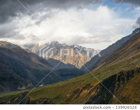 majestic mountain ranges with deep gorges and rocky peaks majestic mountain ranges with deep gorges and rocky peaks 139926328