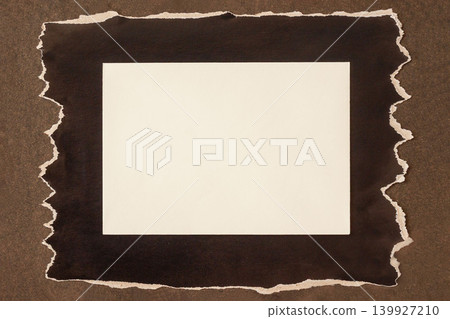 Blank empty card on Torn Black Paper Background. Blank white textured card placed on torn black paper over brown surface, top view above. Minimal paper mockup, rough edges, copy space for notes Blank empty card on Torn Black Paper Background. Blank white textured card placed on torn black paper over brown surface, top view above. Minimal paper mockup, rough edges, copy space for notes 139927210