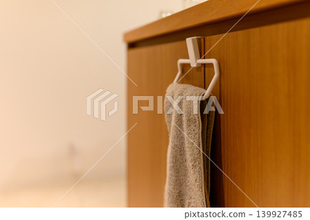Towels in a wooden cabinet Towels in a wooden cabinet 139927485