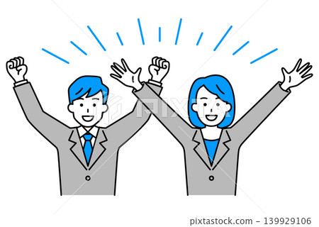 A man and woman in suits cheering with their arms raised in victory. A man and woman in suits cheering with their arms raised in victory. 139929106